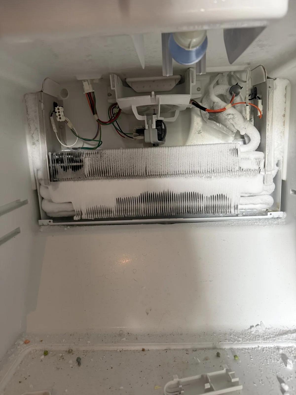 Refrigerator evaporator coil frost repair
